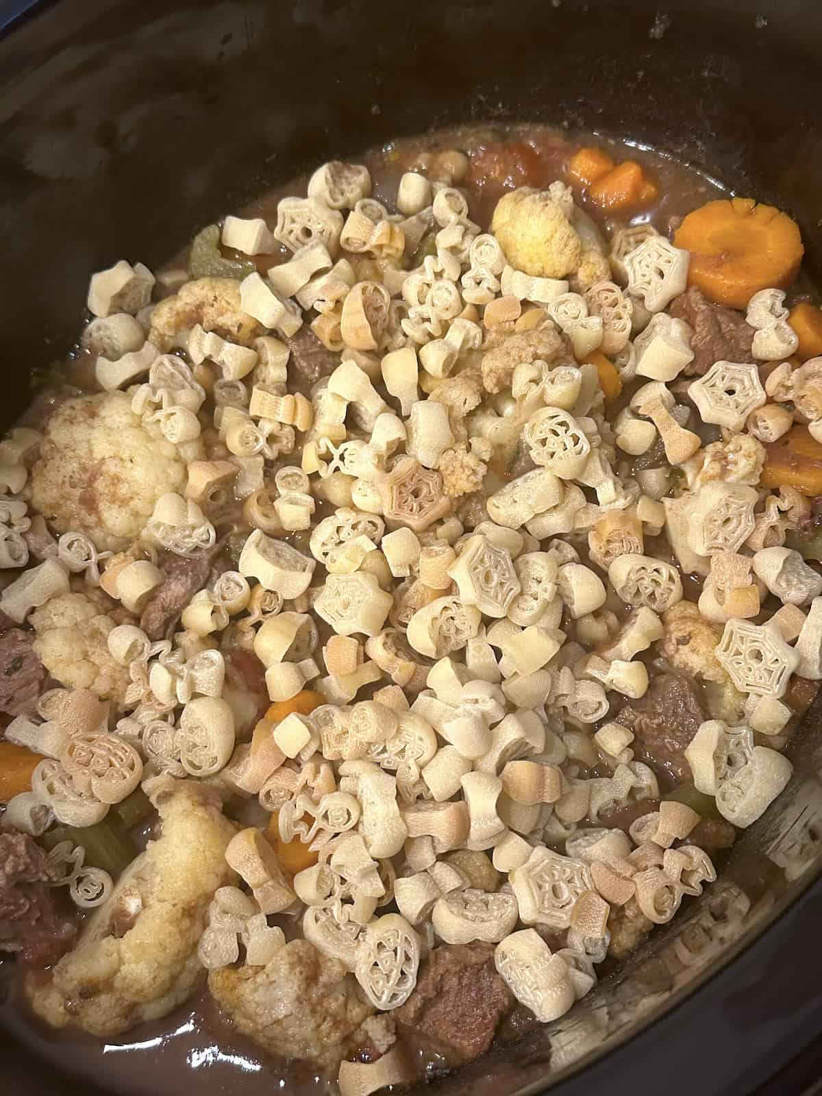 Halloween pasta in witches stew