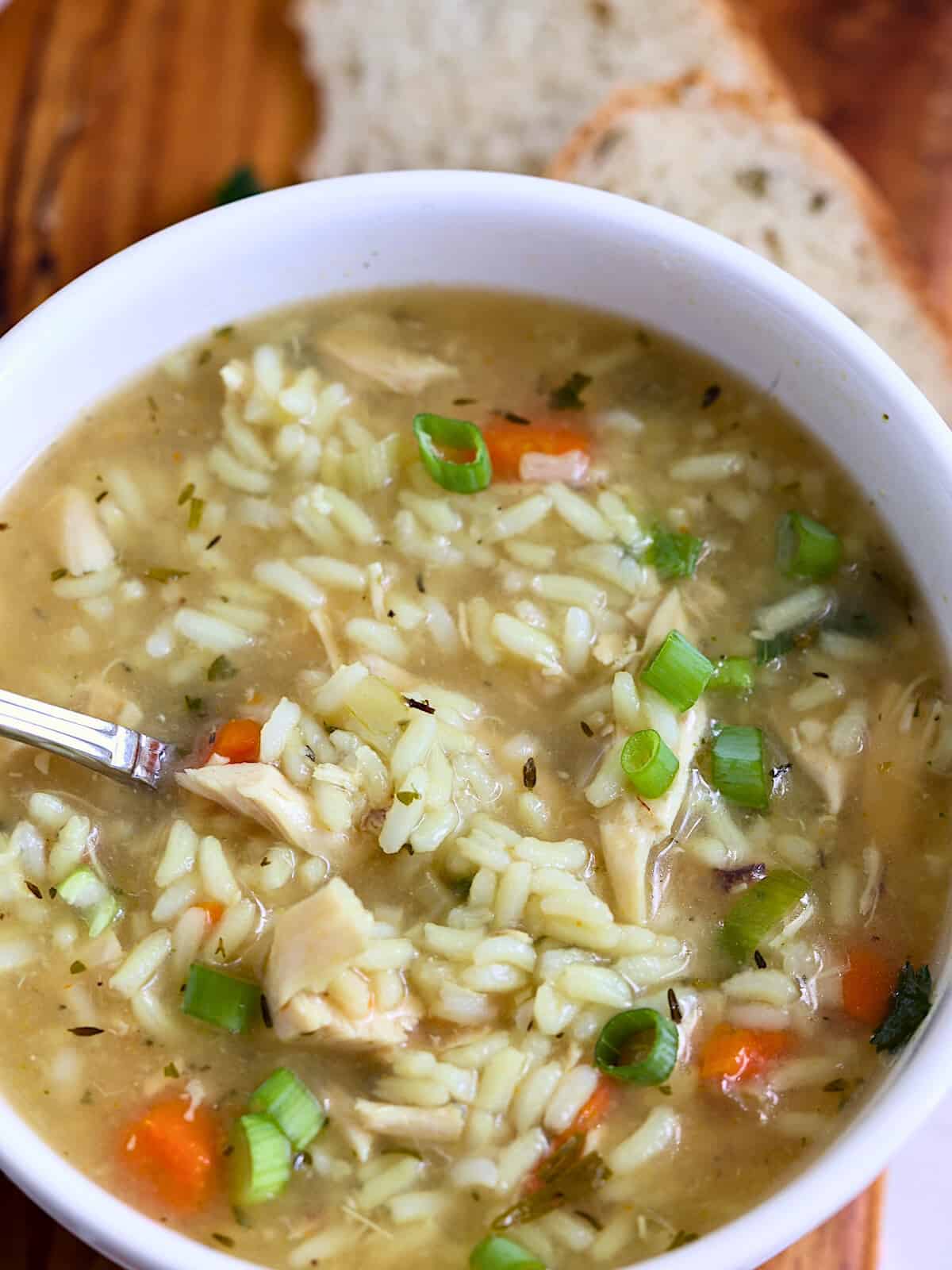 instant pot chicken and rice soup in a serving bowl