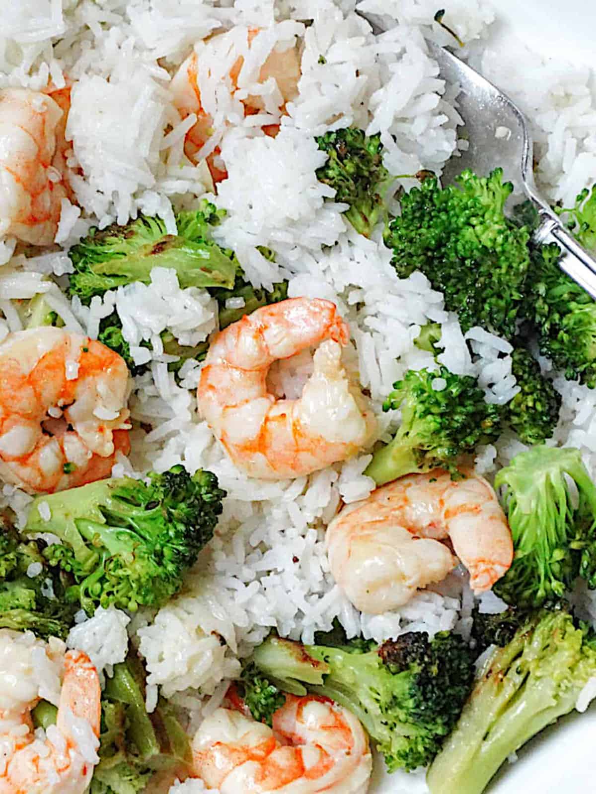 shrimp, broccoli and rice tossed in a bowl