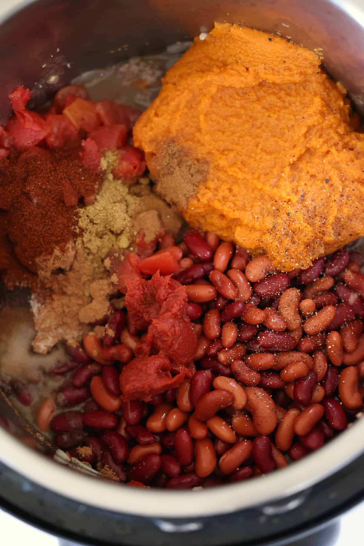 pumpkin chili seasonings and ingredients in a pressure cooker pot