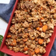 slow cooker witches brew stew in a red dish