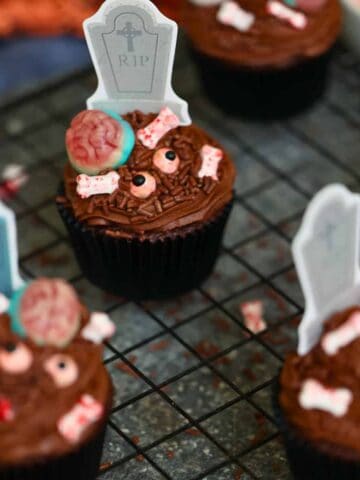 zombie cupcakes on a baking sheet