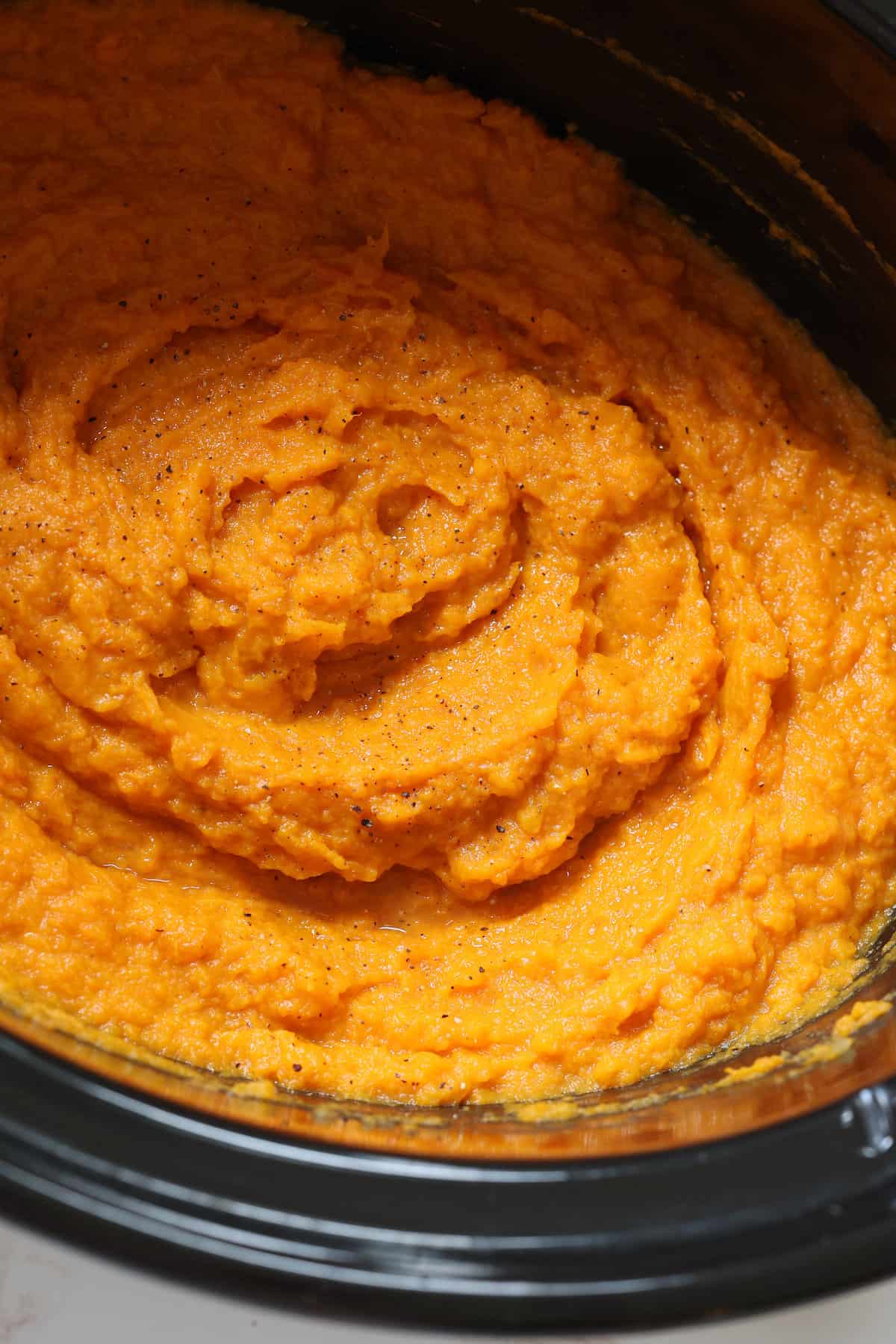 mashed sweet potatoes in a slow cooker