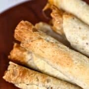 air fried frozen taquitos on a plate