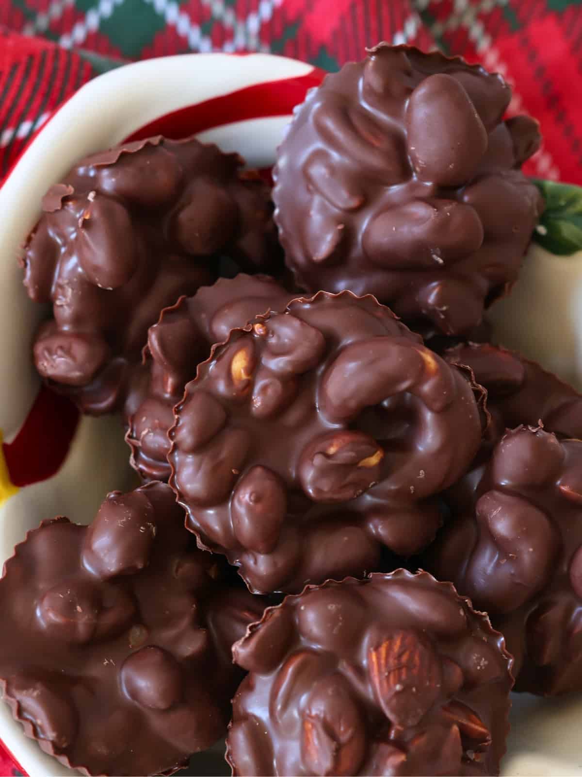 chocolate covered peanut clusters in a bowl