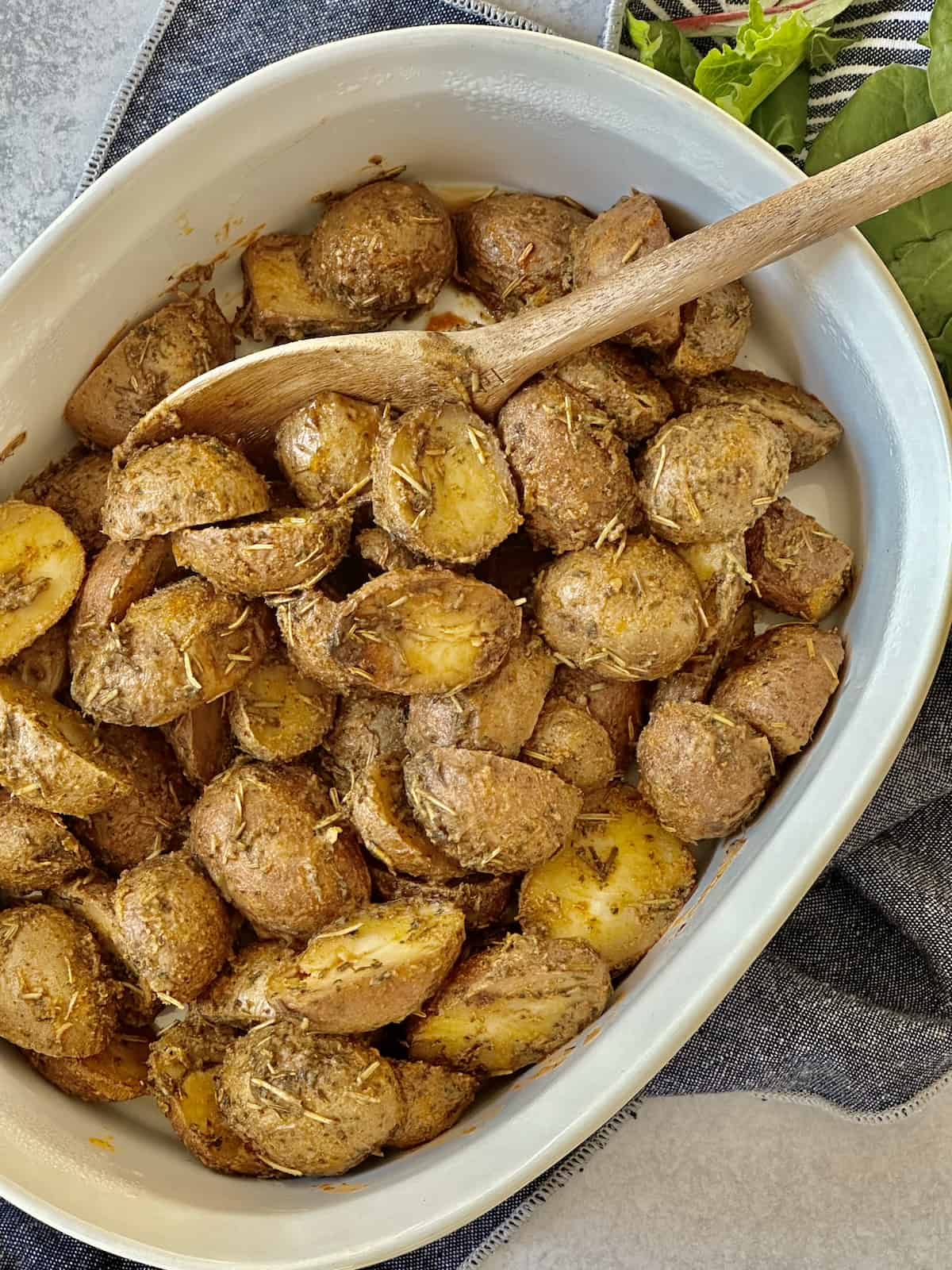 slow cooker baby potatoes in a serving dish