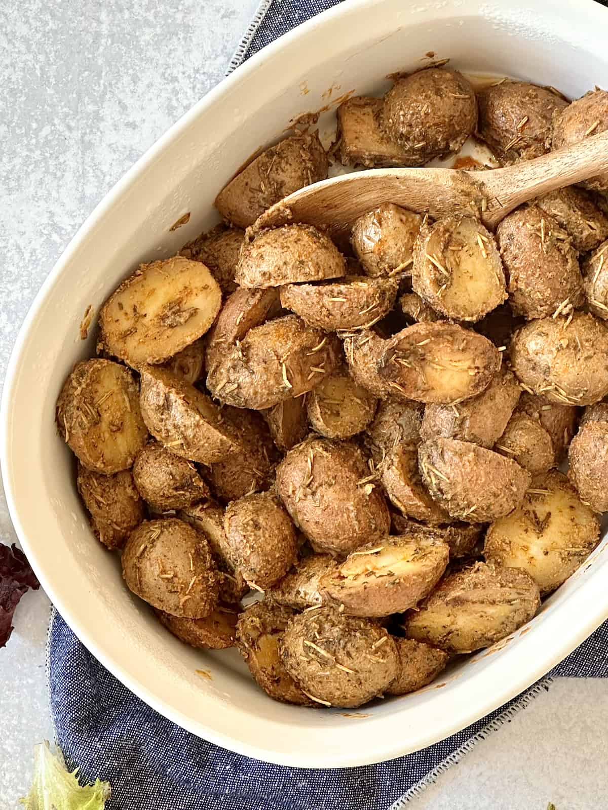 slow cooker baby potatoes in a casserole dish