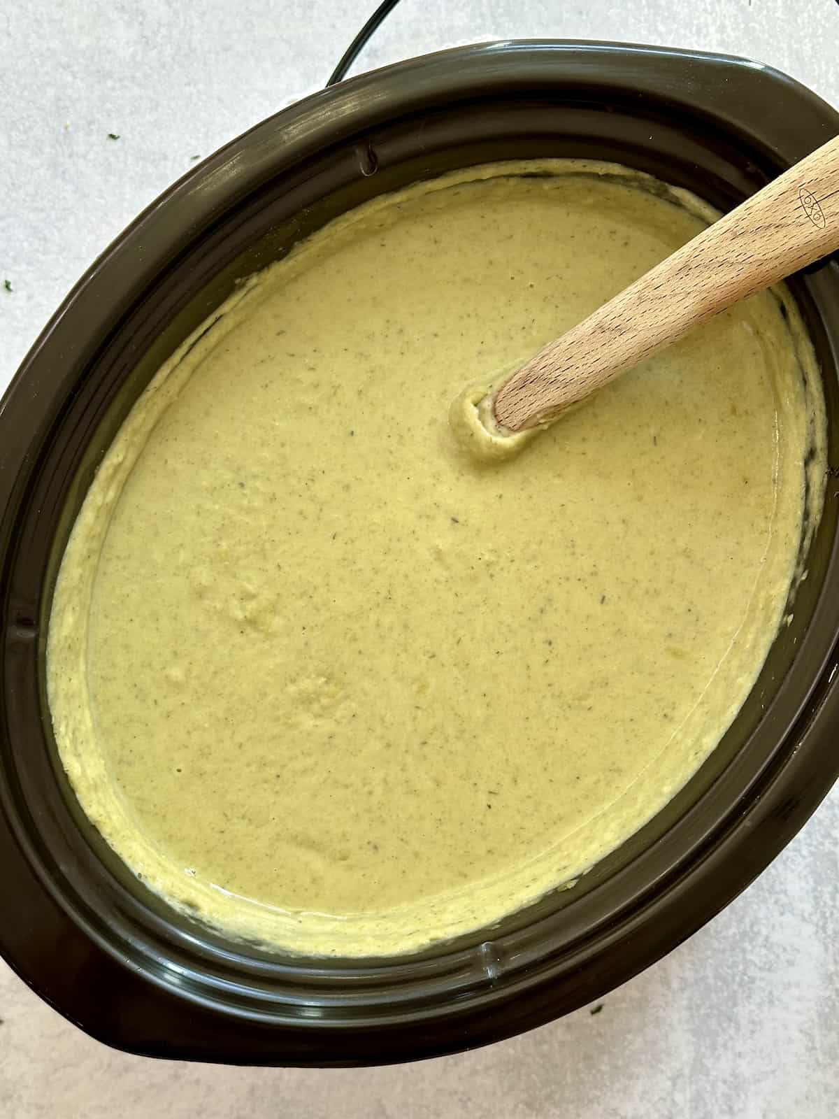 pureed potato and leek soup in a slow cooker