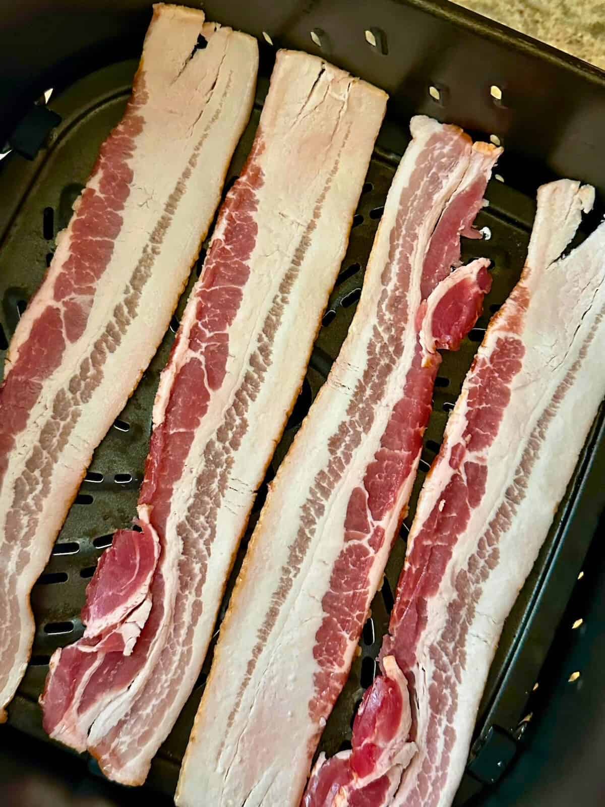 uncooked bacon in the air fryer