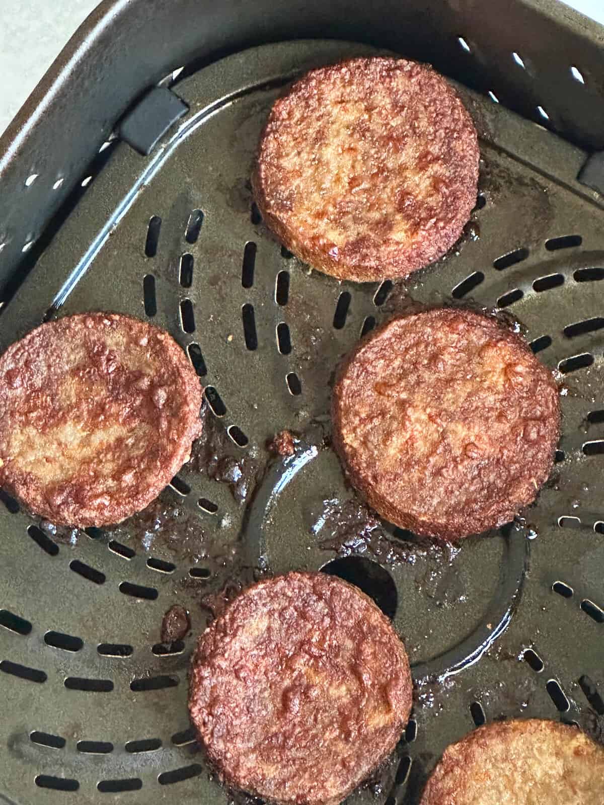 air fried sausage patties on a tray
