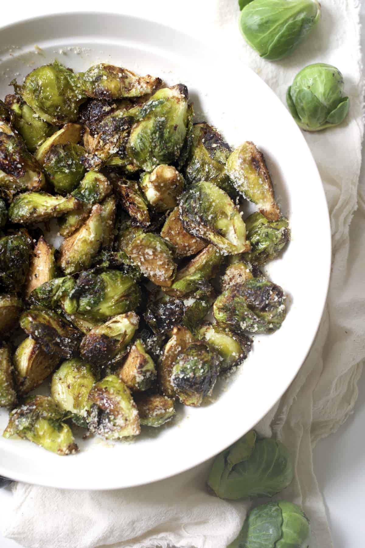 crispy roasted air fried brussels sprouts on a plate