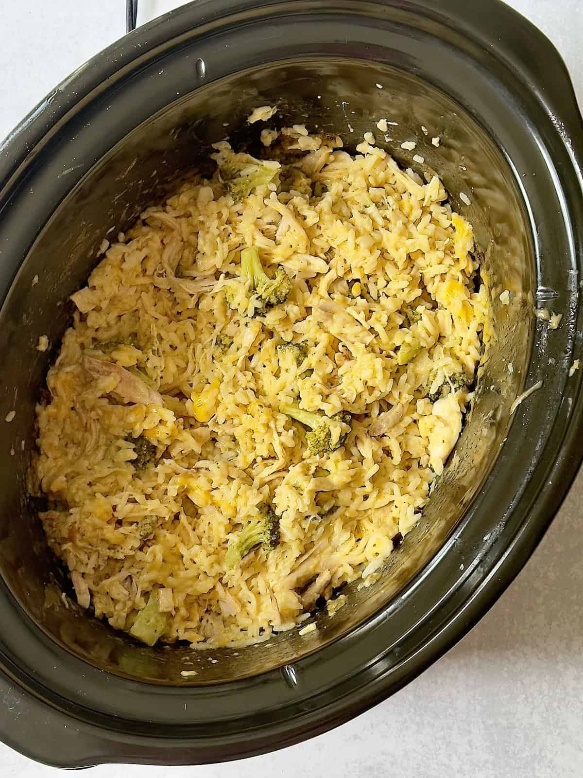crockpot chicken rice and broccoli casserole in the slow cooker