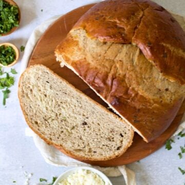 bread machine olive bread on a wooden board