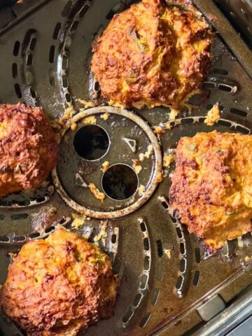 turkey burgers in an air fryer basket