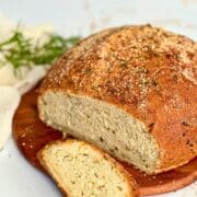 parmesan rosemary bread on a cutting board