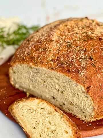 parmesan rosemary bread on a cutting board