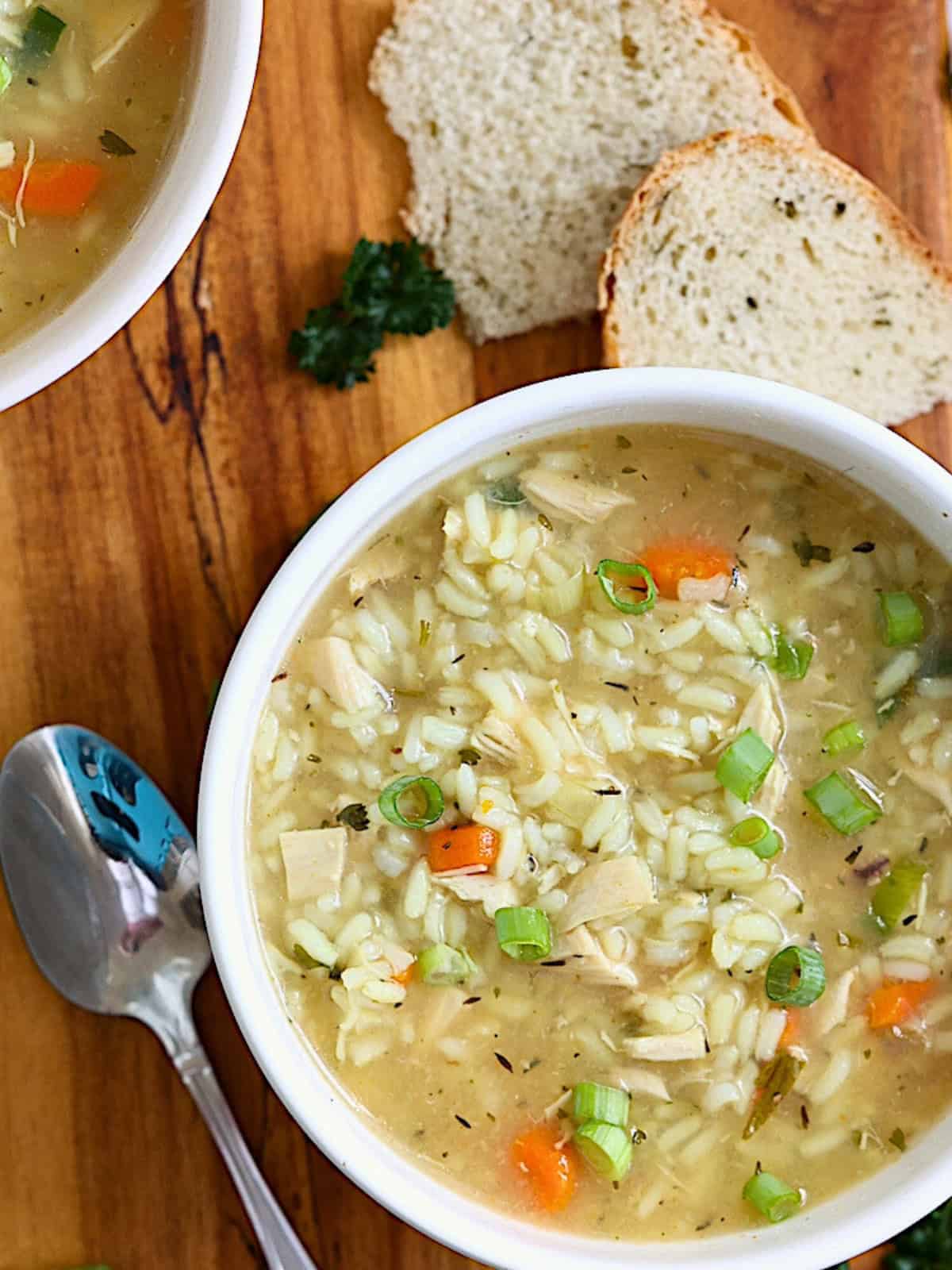 crockpot chicken and rice soup in a white bowl