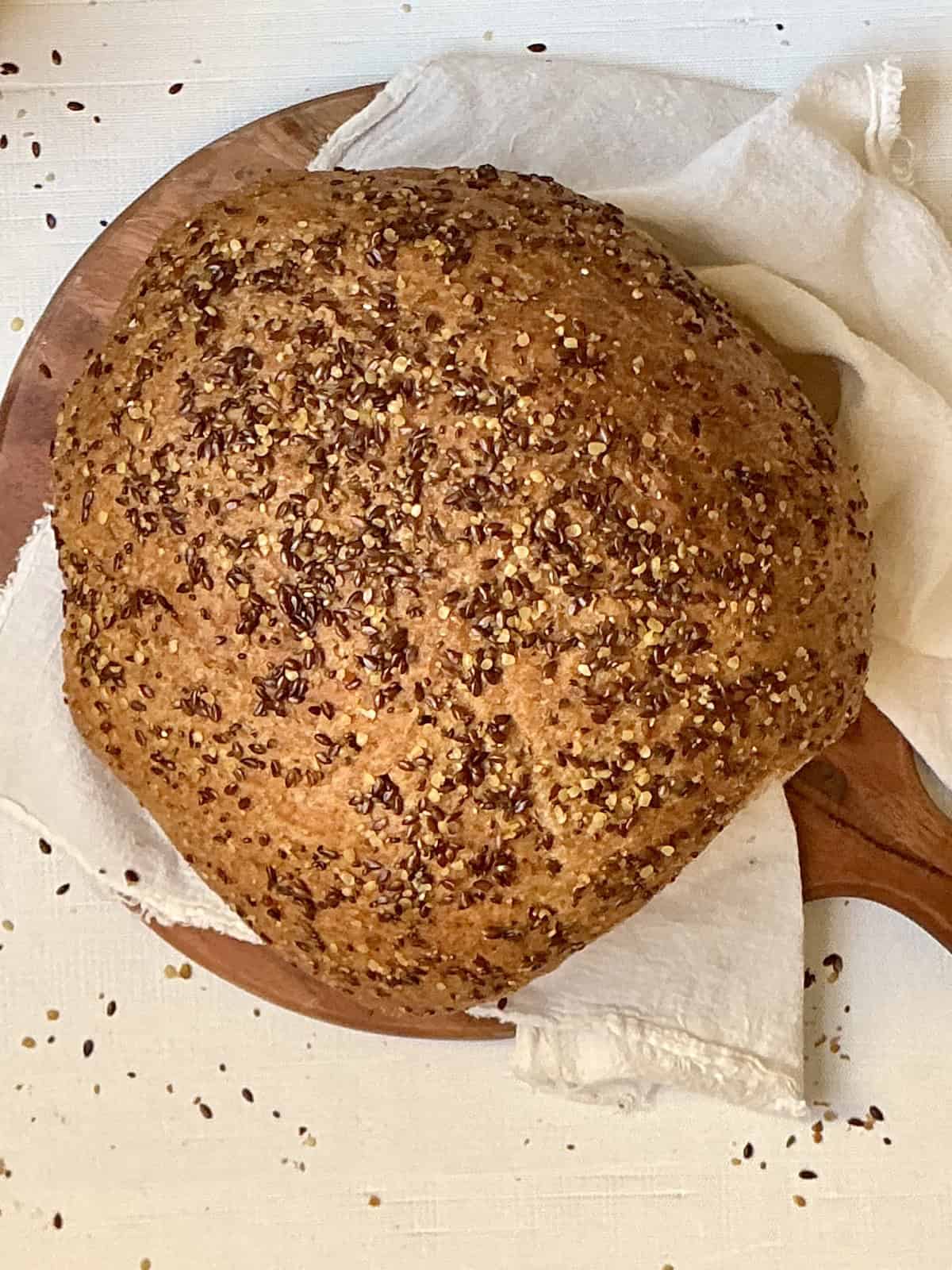 flaxseed bread on a wooden cutting board