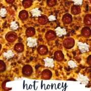 hot honey pepperoni pizza on a pizza peel