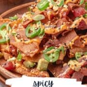 spicy ahi tuna poke nachos in a plate