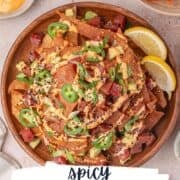 spicy ahi tuna poke nachos in a plate