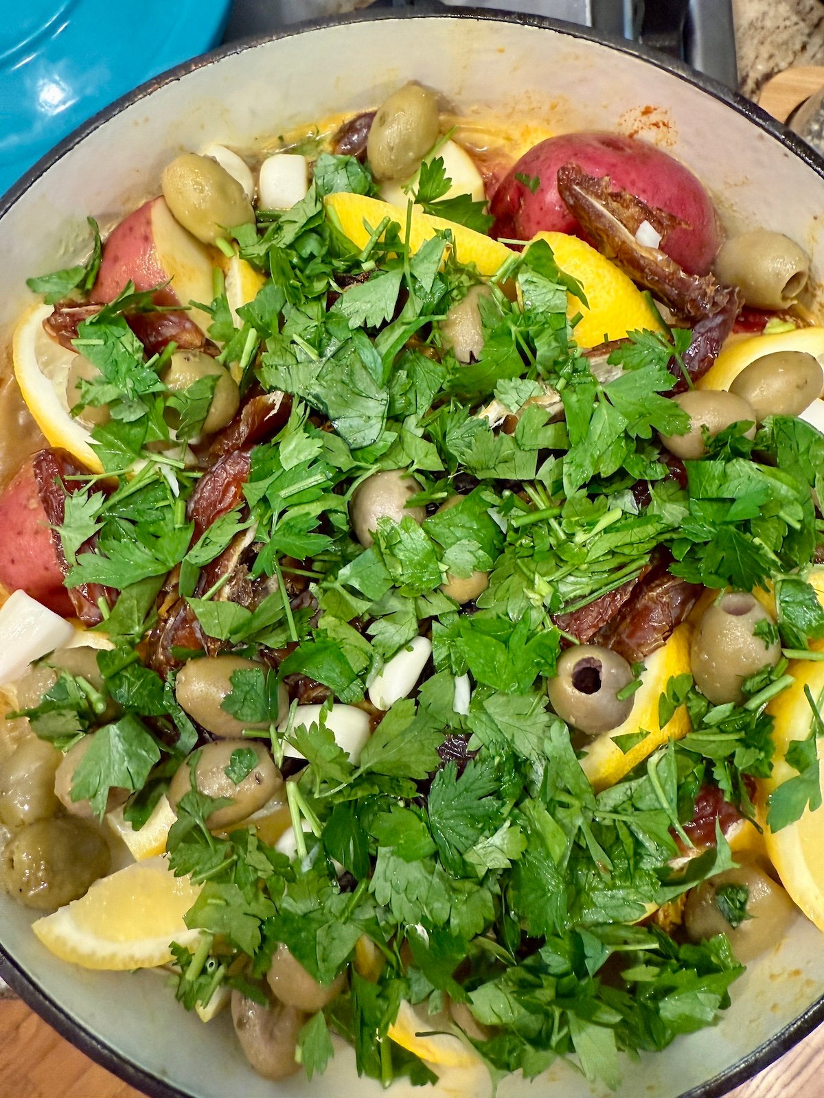 ingredients for moroccan chicken in a dutch oven