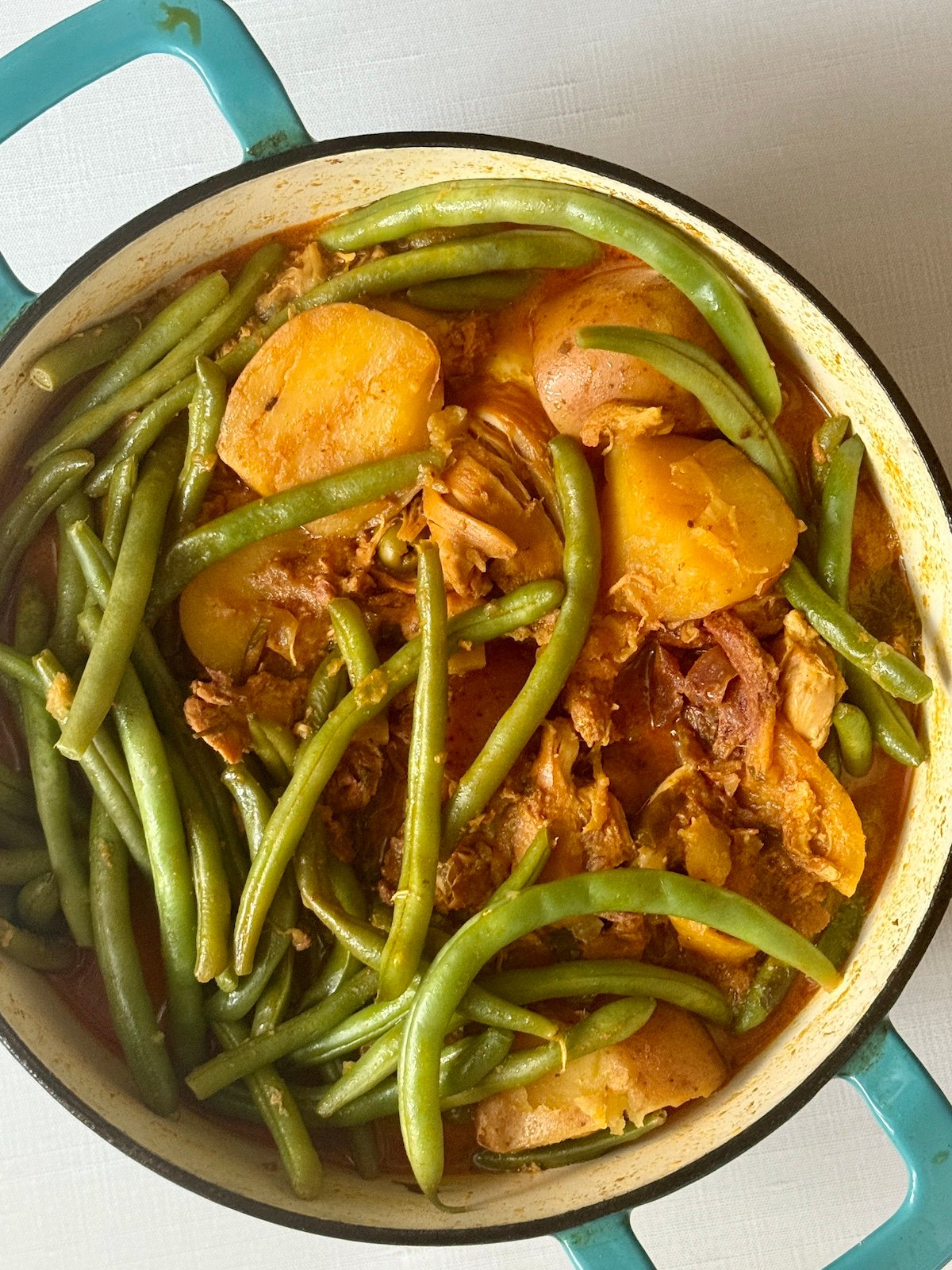 moroccan chicken stew in a dutch oven