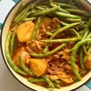 moroccan chicken stew and vegetables in a stock pot