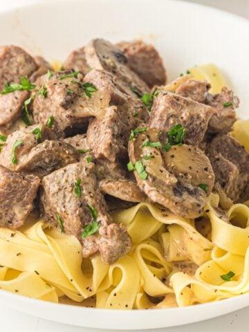 beef stroganoff cooked in a crockpot served over egg noodles