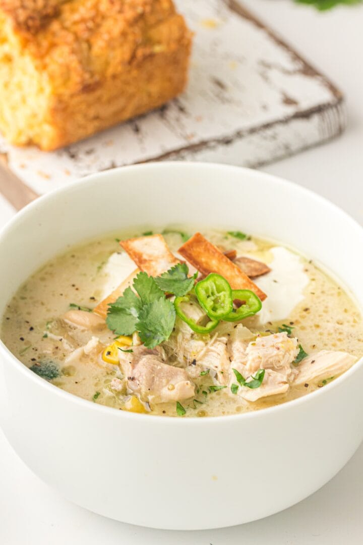 slow cooker white chicken chili in a white bowl