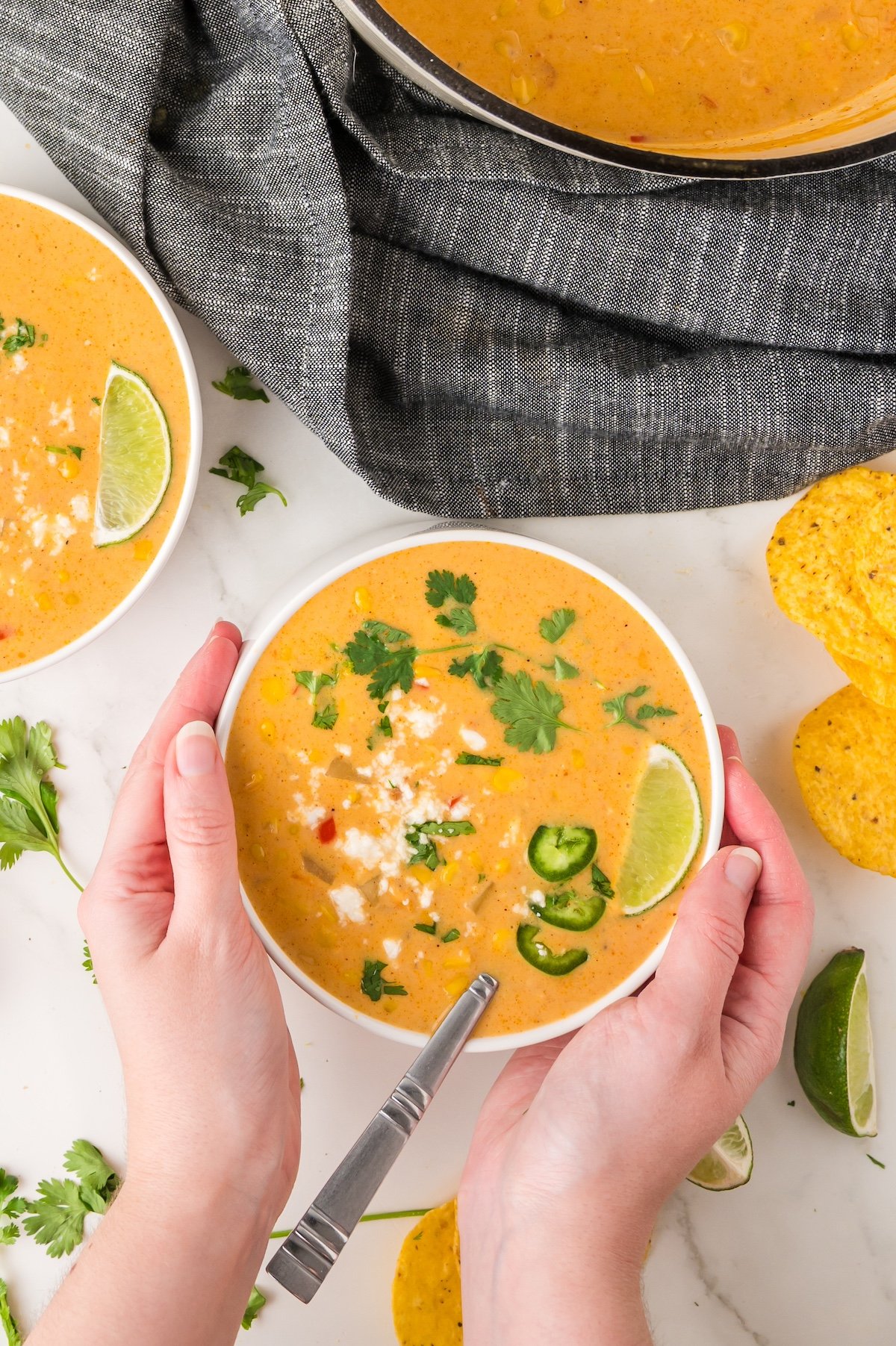 mexican street corn soup in a white bowl