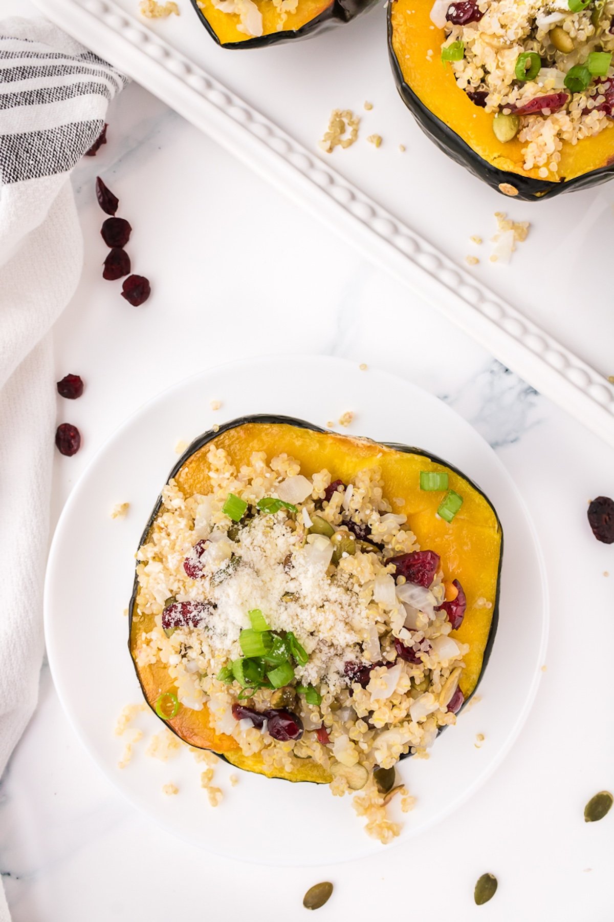close up of stuffed acorn squash on a plate