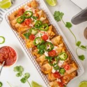 refried bean taquitos on a serving plate