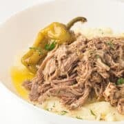 slow cooker mississippi pot roast in a white plate
