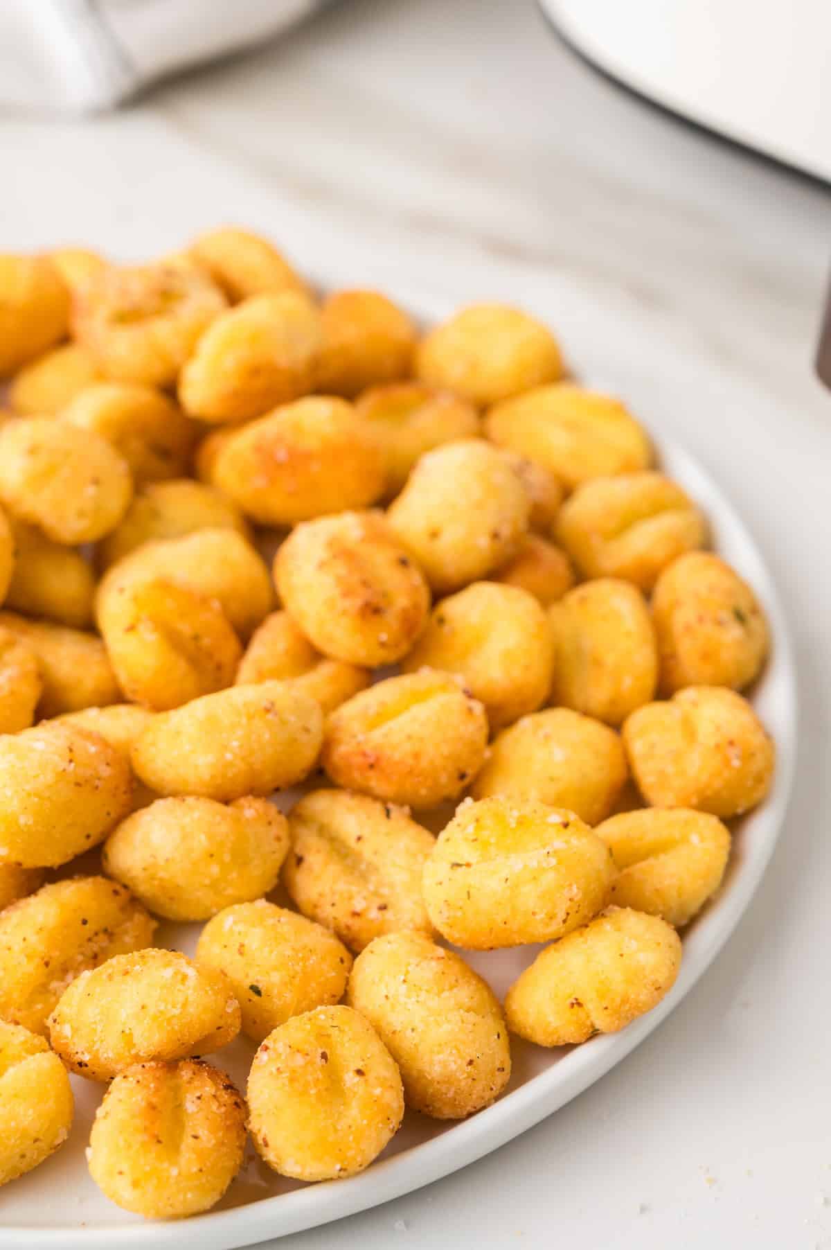 air fried gnocchi on a plate ready to serve