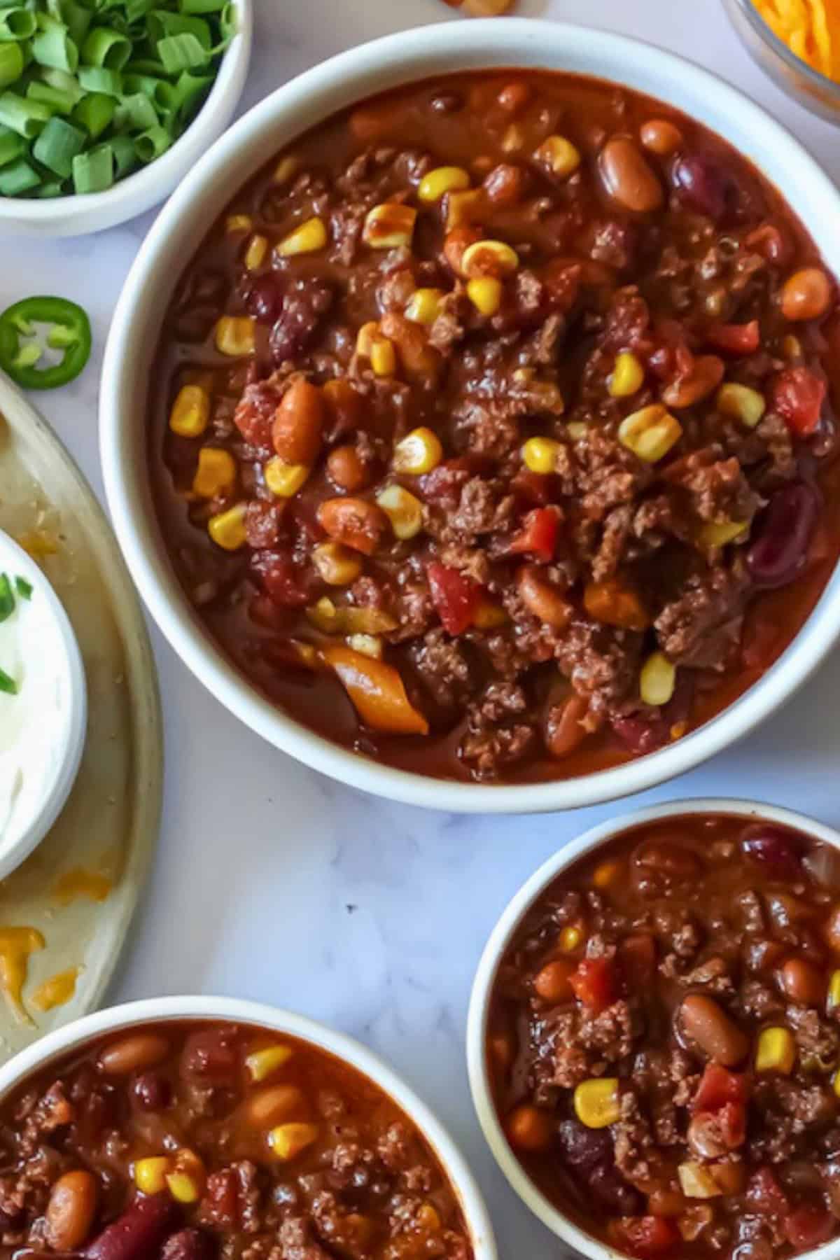 crockpot bean and bean chili in serving bowls