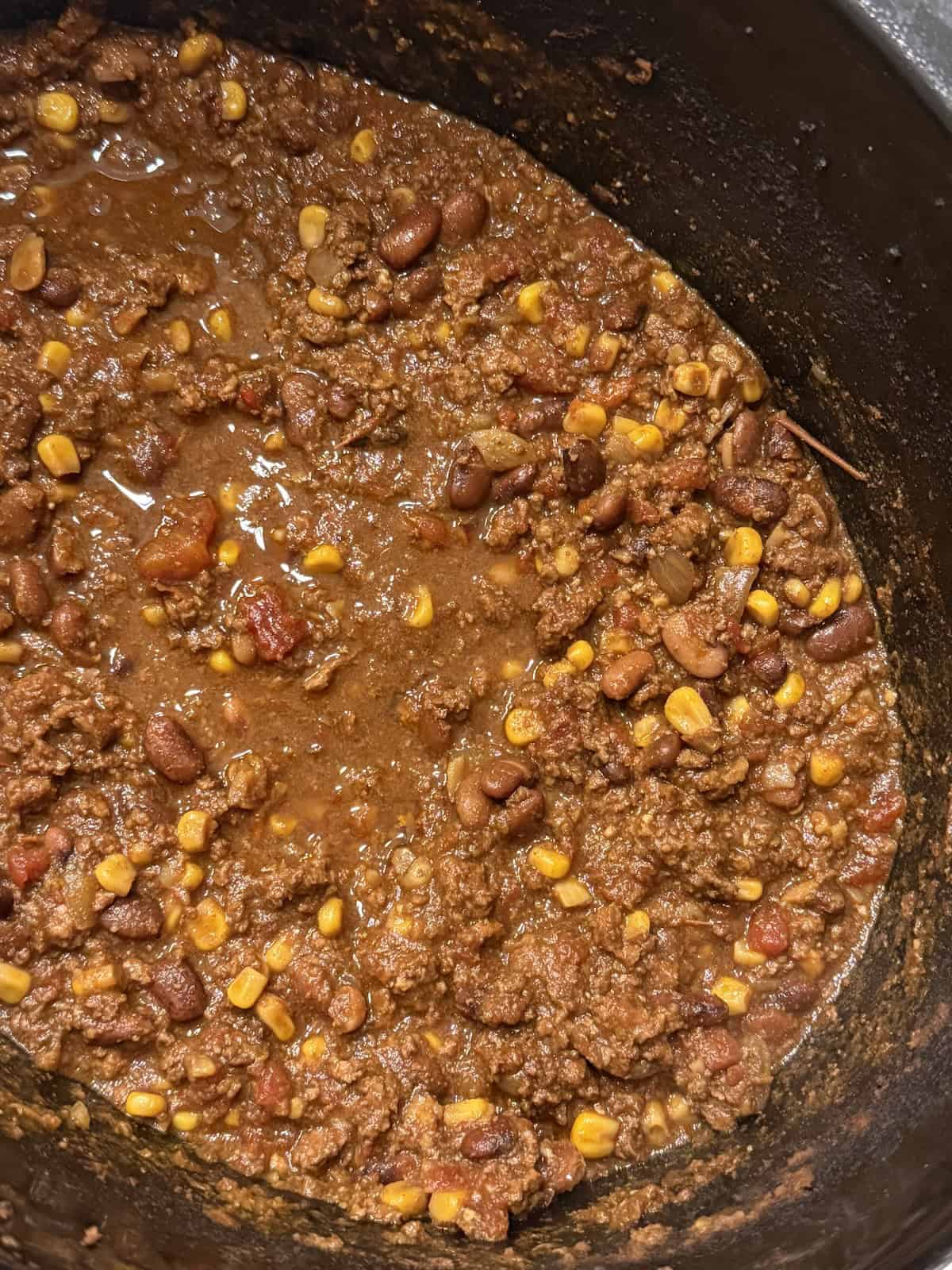cooked beef and bean chili in a slow cooker