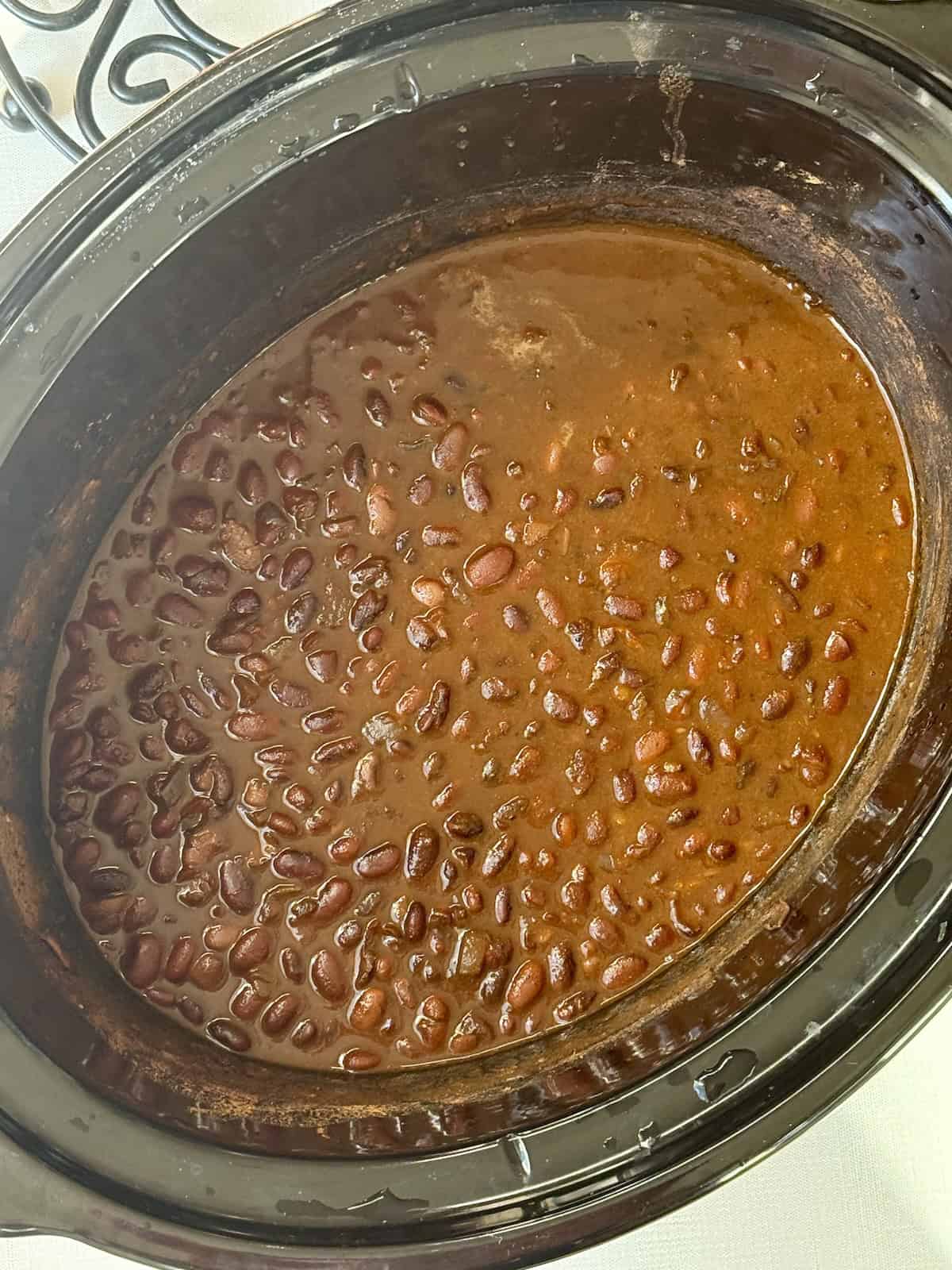 cooked pinto beans in a slow cooker