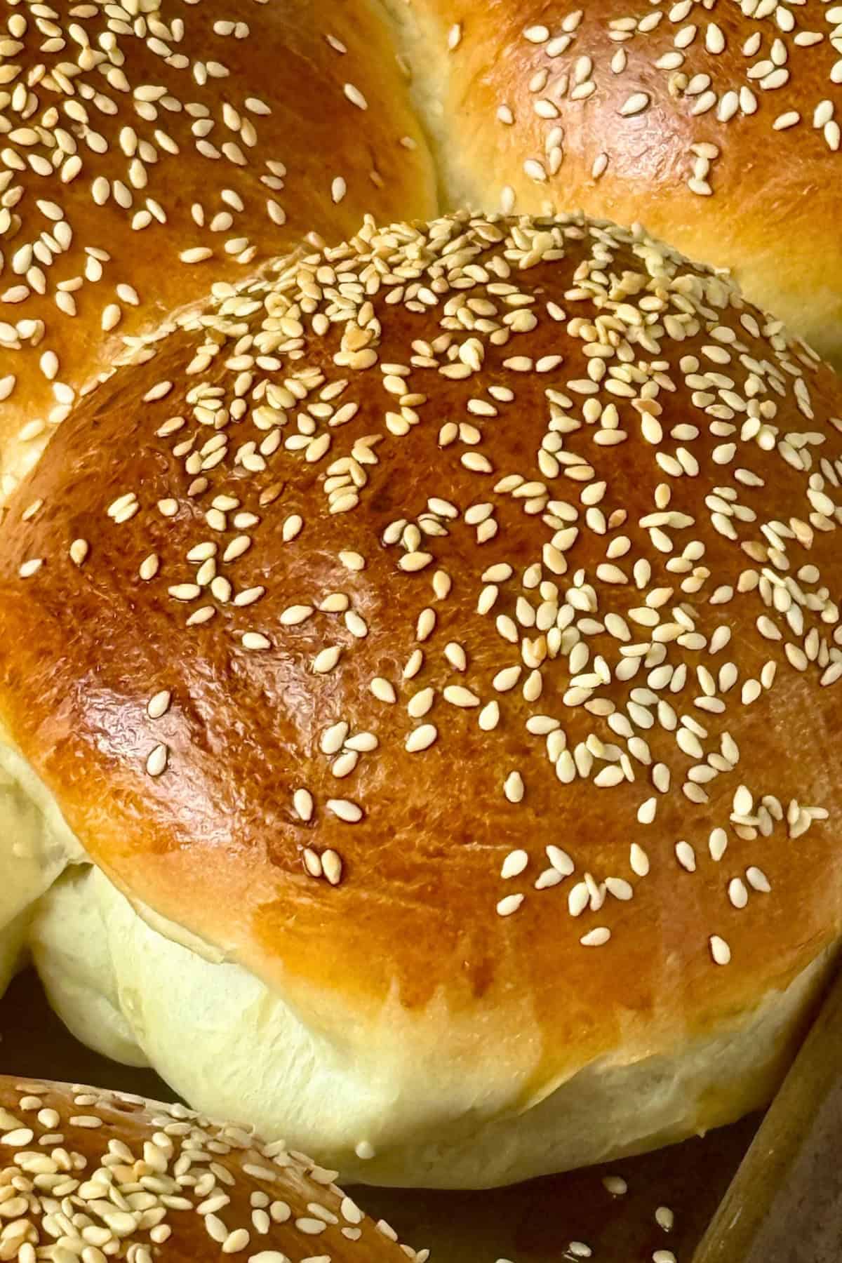 close up of a homemade hamburger bun on a baking sheet