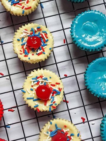 patriotic mini cheesecakes on a cooling rack