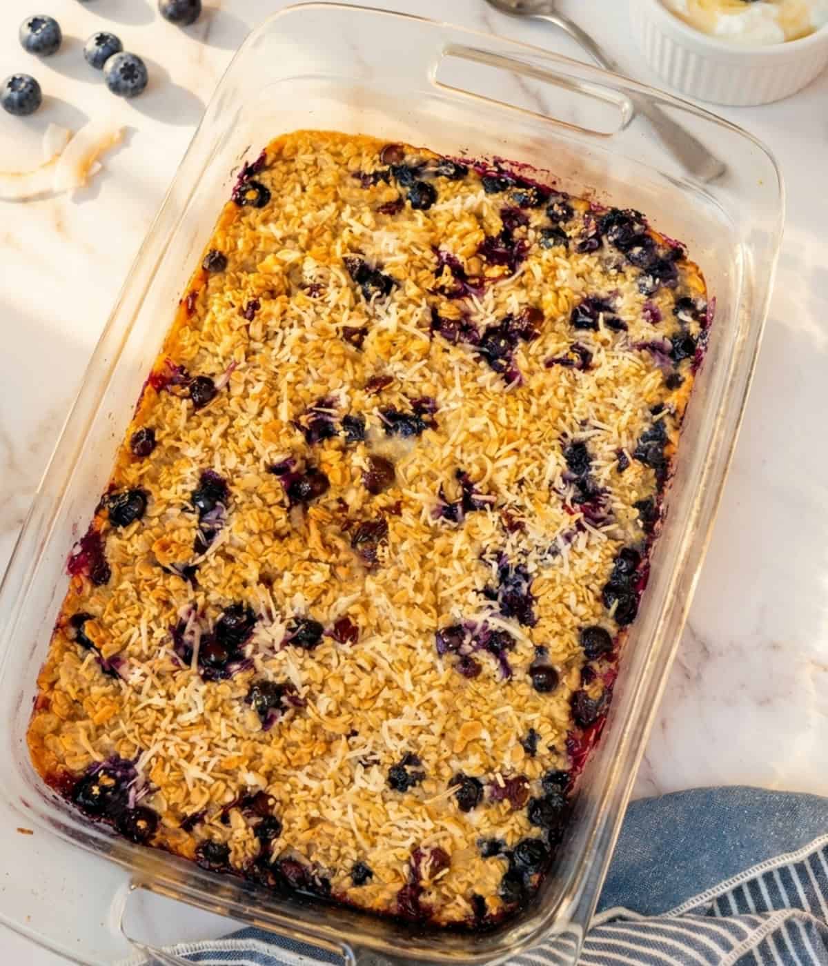 blueberry baked oatmeal casserole in a glass dish
