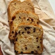 bread maker cinnamon raisin bread sliced on a cheesecloth