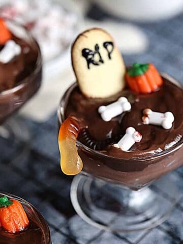 graveyard pudding cups on a cooling rack
