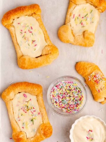 crescent roll cream cheese danish on a baking sheet
