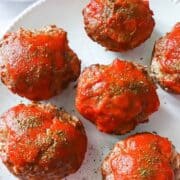 mini muffin shaped meatloaf on a white plate