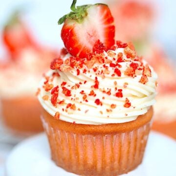 strawberry crunch cupcake on a white plate