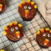 chocolate turkey cupcakes on a cooling rack