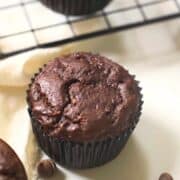 double chocolate zucchini muffins on a counter