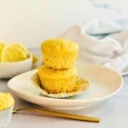 lemon muffins in a stack on a plate