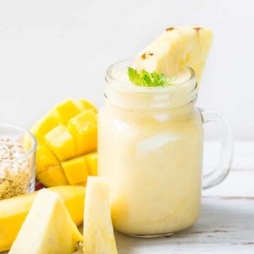 mango pineapple smoothie in a glass